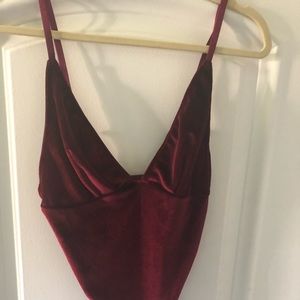 Red velvet bodysuit. Never worn. Tags attached.